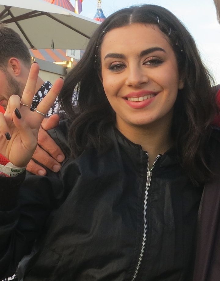 Charli XCX and George Daniel Flaunt Personal Style at Wedding Guest Event