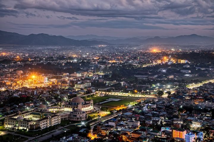 Imphal‑Dimapur‑Guwahati Bus Service Restarts After Three‑Year Hiatus Under Security Cover