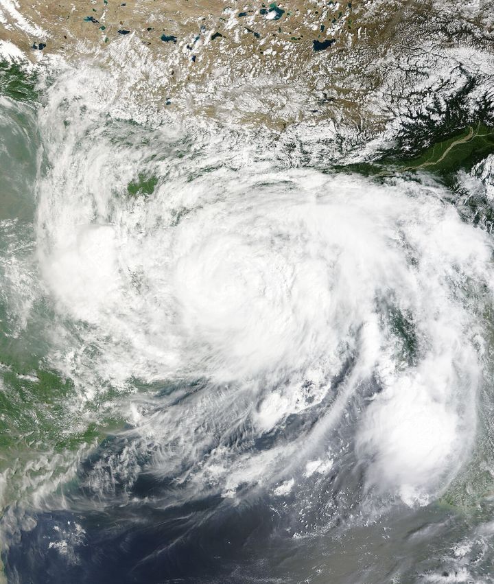 Deep depression brings extreme rain to east, intense heat to west